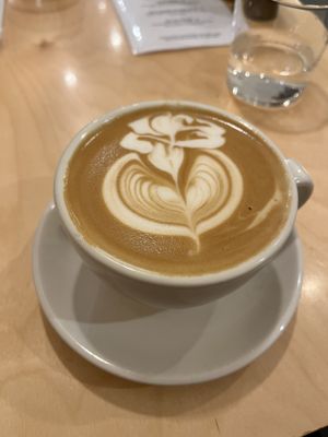 Flat white with oat milk  at Ten Square Cafe in Melbourne