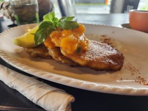 Corn and kūmara fritters with papaya salsa at Flying Turtle Cafe in Rarotonga