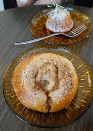 Gingerbread pulla & orange rosemary "piimä" cake at Kahvila Rakastan in Helsinki