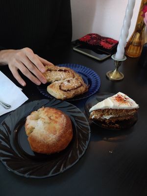 In the back cinnamon roll, on the right carrot cake and in the front the 'butter' bun at Kahvila Rakastan in Helsinki