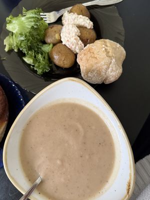 Buffet of roasted cauliflower soup, slow cooked potatoes and a cinnamon bun for dessert    at Kahvila Rakastan in Helsinki
