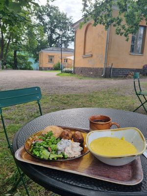 Cozy outdoor seating at Kahvila Rakastan in Helsinki