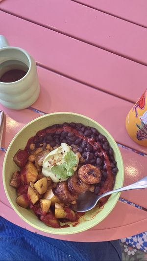 vegan/gf breakfast bowl: rice, sofrito black beans, seasoned roasted potatoes, freshly fried plantains, avocado crema   at Little Rico in Hudson