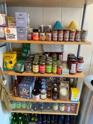 Shelf of food stuff for sale at Little Rico in Hudson