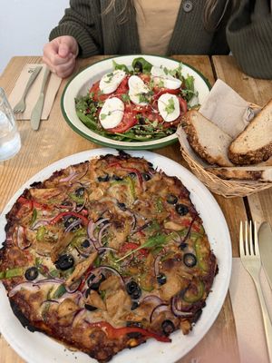 Vegan bbq pollo pizza, vegetarian capese salad   at Natura in Madrid