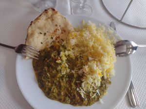 €13 curry and rice, whole garlic naan €3.50 at Le Maharaja in Dijon