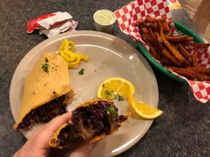 Spicy beef strips wrap with sweet potato fries at Green Vegetarian Cuisine at Alon in San Antonio