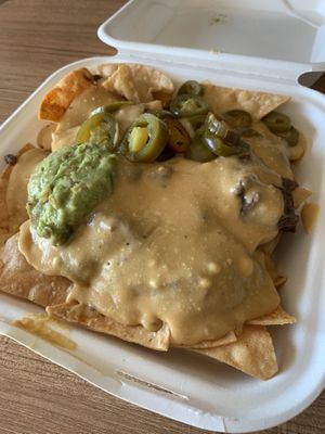 Deluxe nachos. Solid. Bold flavors but too salty   at Green Vegetarian Cuisine at Alon in San Antonio