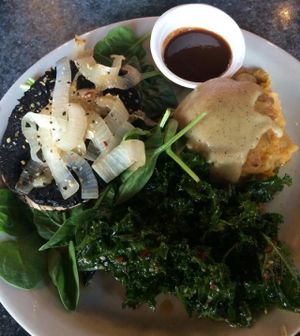 Portobella mushroom steak with mashed potatoes, gravy, and sauteed kale at Green Vegetarian Cuisine at Alon in San Antonio