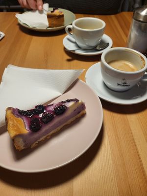 Blueberry cake + cappucino at Greens Cafe Deli in Kempen