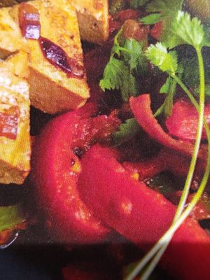 Curry madras van gekleurde paprika at De Vegan Box in Amsterdam