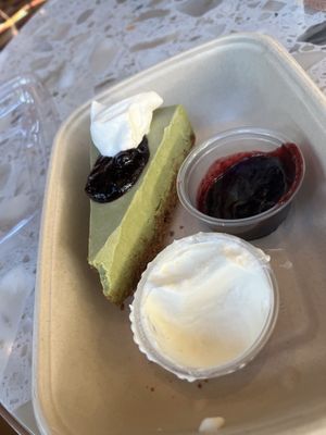 Matcha cheesecake to go. Had to get a bite before we left.   at Planta Queen - Fort Lauderdale in Fort Lauderdale