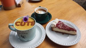 Golden milk with soy milk + vegan cheesecake at La Otilia - Polanco in Mexico City