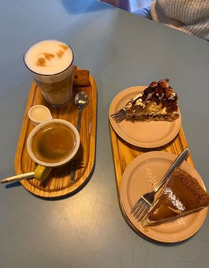 Coffees, tiramisu cake, speculoos mousse cake  at LUDO in Ghent