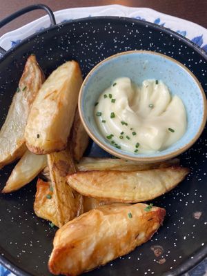 Rustic potatoes with agave beer mustard sauce at Chia Chill Café in Madrid