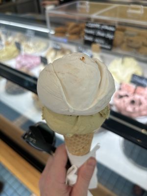 A scoop of pistachio ice cream (bottom) and chewy Greek kaimaki on top (a recipe made with resin from the mastic tree)  at Sugar Killer in Athens
