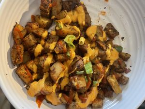 Roasted potatoes with sriracha and spicy mayo  at Love n Light in St Louis