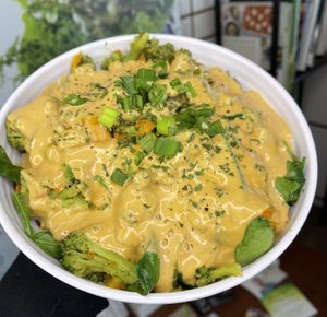 Sautéed veggies and ginger peanut sauce over jasmine rice   at Love n Light in St Louis