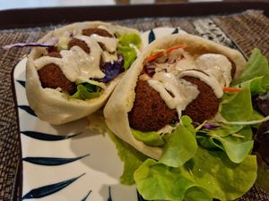 Falafel hummus slaw tahini dressing with pita bread at Poke Bowl in Koh Chang