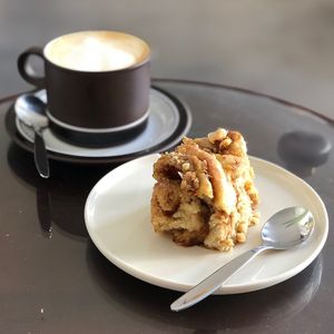 Cinnamon roll and oat cappuccino 🥰  at BIG Sister in Nancy