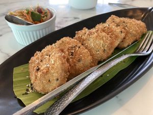 Fish with mango salad  at May Veggie Home in Bangkok