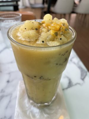 Iced passion fruit drink, 89 baht (plus 7% sales tax)  at May Veggie Home in Bangkok