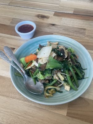 Sukiyaki (Japanese dish): stir fried veggies, tofu, noodles, with a side sweet and sour sauce.   at May Veggie Home in Bangkok