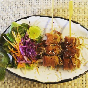 “Bacon” wrapped enoki mushroom skewers  at May Veggie Home in Bangkok