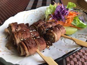 Bacon wrapped Enoki mushroom  at May Veggie Home in Bangkok