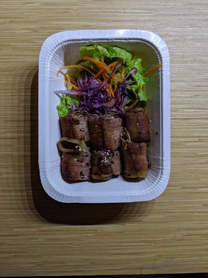 Bacon wrapped enoki mushrooms at May Veggie Home in Bangkok