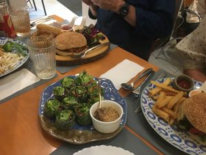 Rice paper rolls and burgers at May Veggie Home in Bangkok