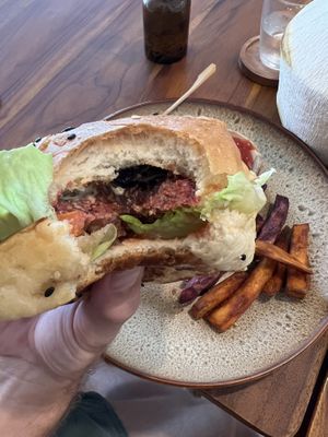 Vegan cheese burger. Patty looks like beetroot but it tasted like a meat patty! Very nice flavour   at Chickpea Bali  in Ungasan
