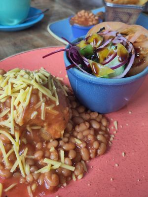 Vegan baked potato with beans and v cheese at Flissys Coffee Shop in Thurstaston