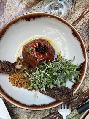 Slow roasted tomato with garlic bread, sage and
fresh sprouts   at Jardineiro - Vegan Kitchen in Porto