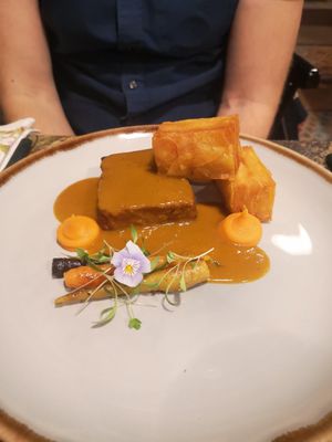 Loin with potato gratin, glazed carrots and port reduction at Jardineiro - Vegan Kitchen in Porto