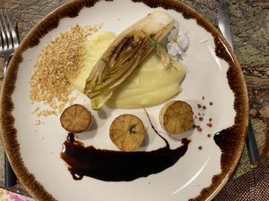 Mushroom scallops with truffled mashed potatoes and endive with fig oil  at Jardineiro - Vegan Kitchen in Porto