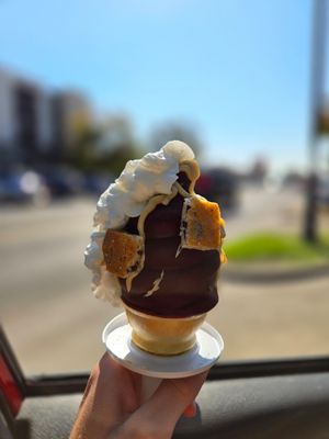 Half size cookies cake cone. Flavors are delicious. Texture of the cookie butter ice cream isn't very creamy. at Normal Ice Cream in Salt Lake City
