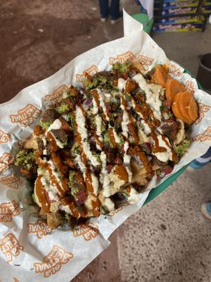 Sus nachos griegos 🙌🏻  at Tacones Lejanos - Cloud Kitchen in Mexico City