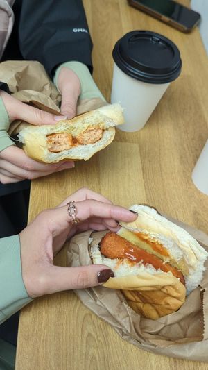 Breakfast roll with vegan sausage and tomato sauce at Snax Cafe in Edinburgh