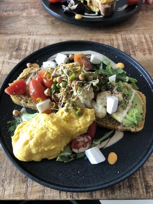 Focaccia with cauliflower, other veg, vegan scramble   at Alua Catering Cafe in Dresden