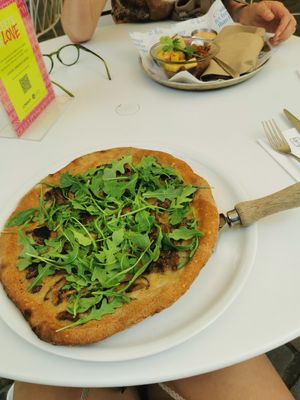 Truffle and Funghi Pizza at Flax & Kale - La Roca Village in Barcelona