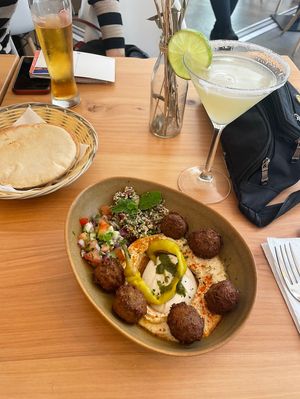 Really lovely lunch spot- Reasonably priced and clearly labelled vegan options on menu including hummus bowls, salads, vegetable burgers and hummus plates, great drink options too  at Cafe Manah in Lisbon