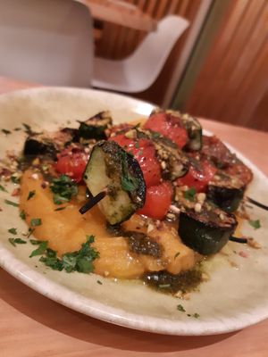 Grilled curgette and tomate with mashed sweet potato and pumpkin at Cafe Manah in Lisbon