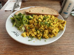 Vegan scrambled tofu with toast   at Blue  in Amsterdam