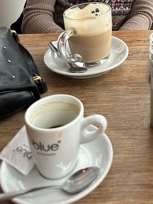 Chai latte (oat milk) and coffee with speculoos liqueur   at Blue  in Amsterdam