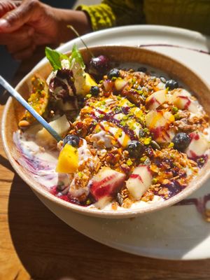 Granola, yogurt, and fruit at IVY Bistro & Café in Hamburg