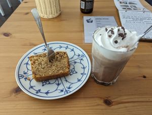 Franzbrötchen cake and cocoa with ice cream and whip. at Katers Köök in Hamburg