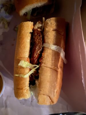 Half of Hot Sausage Poboy.  at Plant Bass Vegan Deli in Harvey