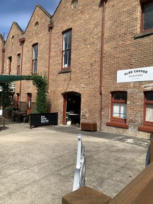 Exterior with outdoor seating  at Glee Coffee Roasters in Wyong