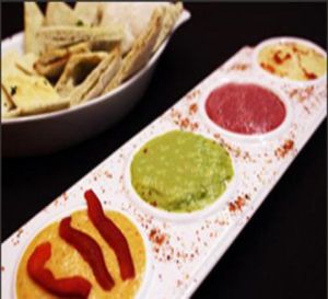 Four awesome flavors of VEGAN hummus! at California Cantina in Santiago